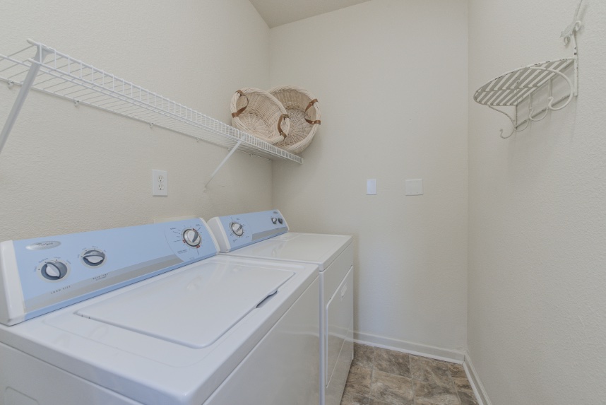 Laundry room with storage space in Indianapolis.